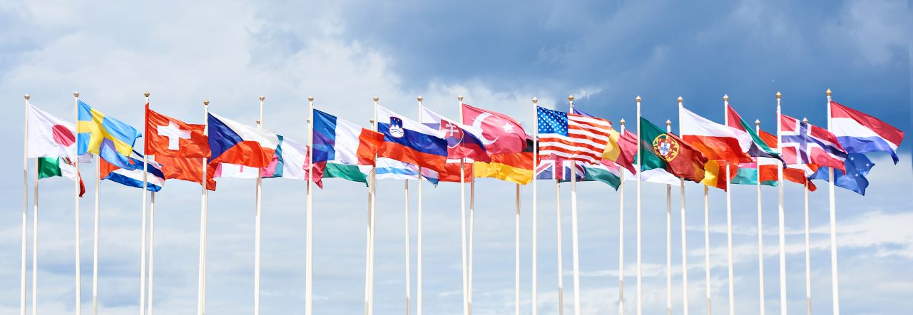 Flags,Of,Different,Countries,On,High,Flagpoles